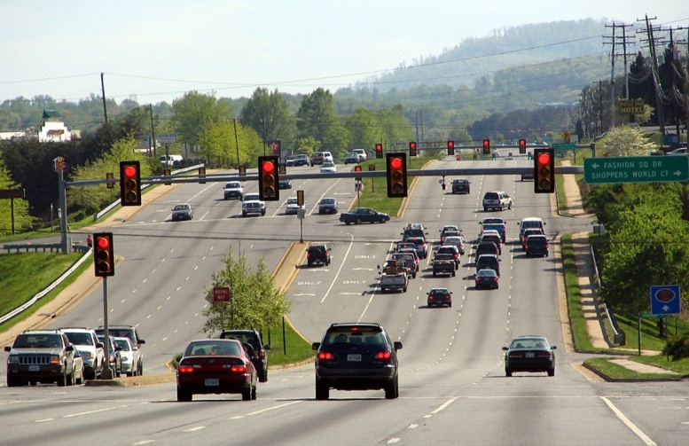 Vehicles stopped at a traffic signal