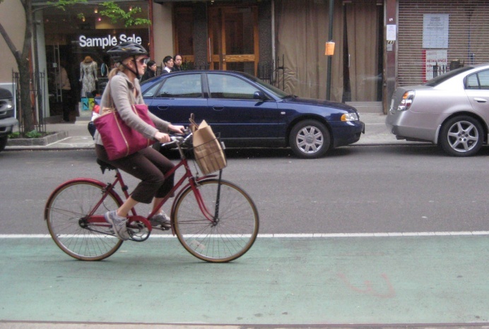 Woman riding a bike on the street