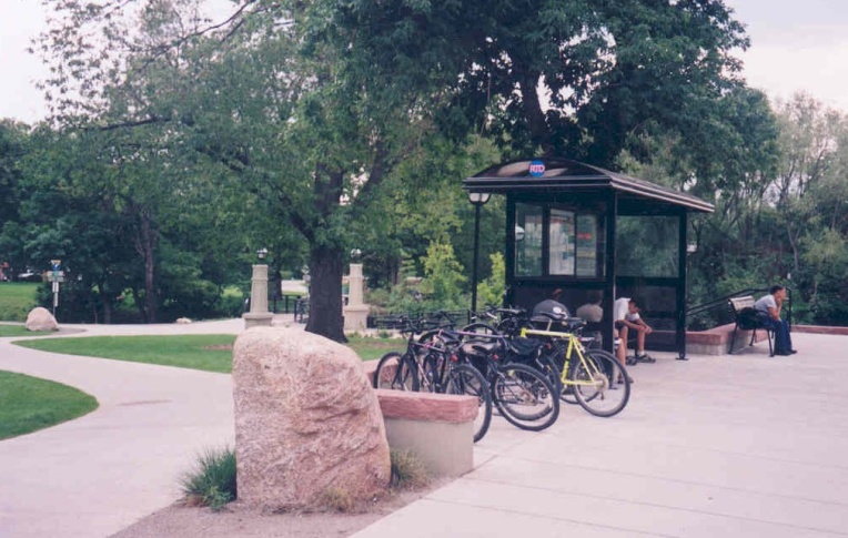 Bus stop with bike rack.