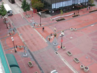 The at-grade intersection and street section blend in with adjoining outdoor plaza.