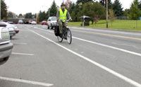 Exiting driver's view of approaching traffic along back-in parking zone.