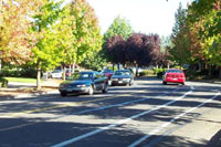 Vehicles tend to intrude into bike lanes on curved roadways (Crescent Avenue).