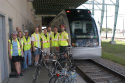 Bicyclists at a Houston METRO station.